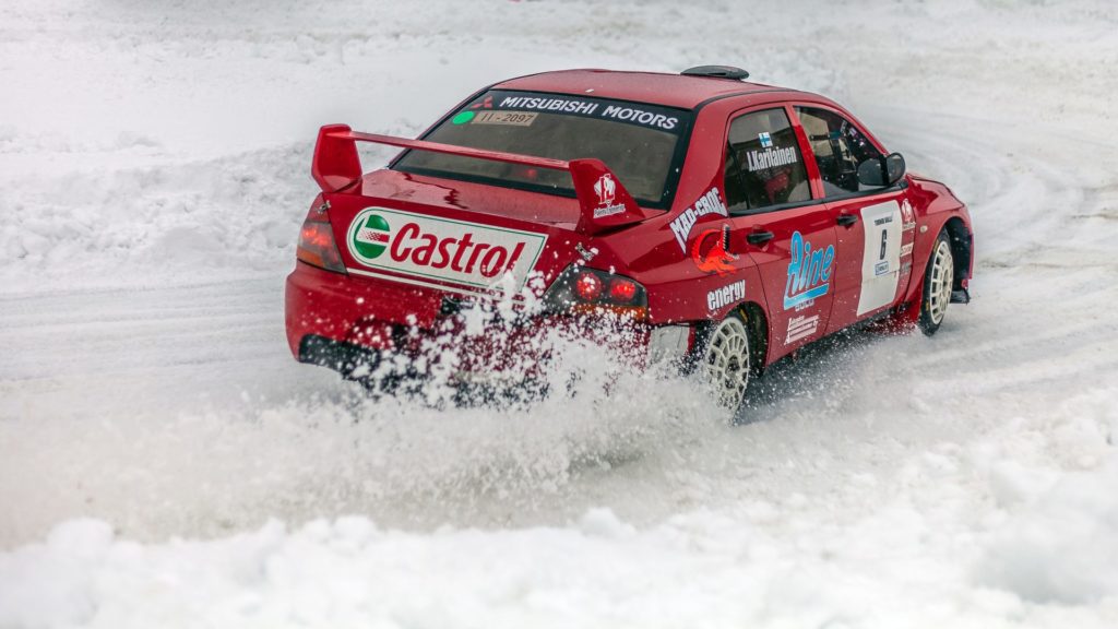 Rally car in snow - Photo by Ferhat Deniz Fors on Unsplash